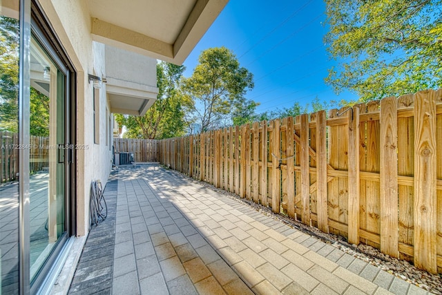 view of patio featuring central air condition unit