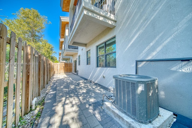 view of property exterior with central air condition unit