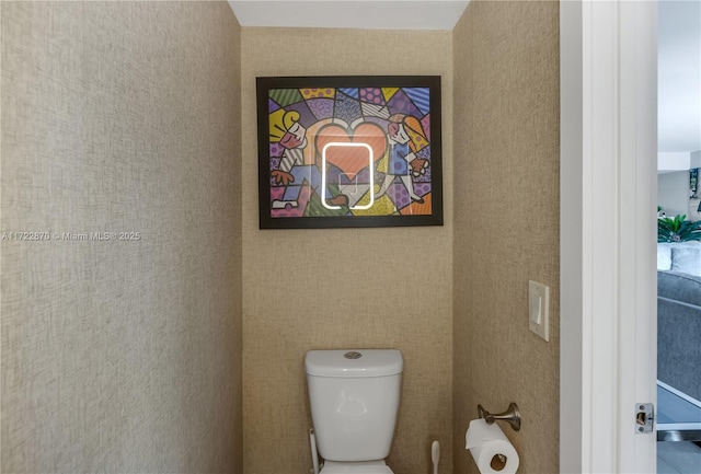 bathroom featuring toilet