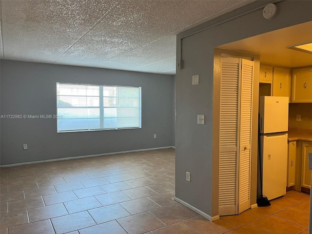 interior space featuring light tile patterned flooring