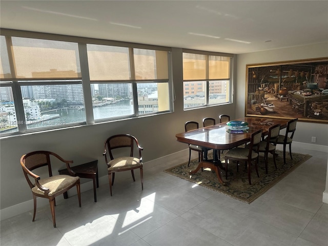 dining room with tile patterned flooring