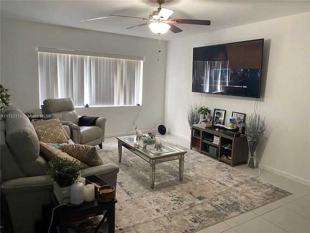 tiled living room featuring ceiling fan