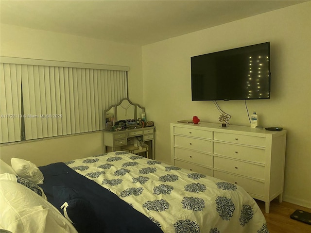 bedroom featuring hardwood / wood-style floors