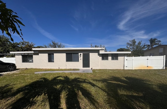 exterior space with a front lawn