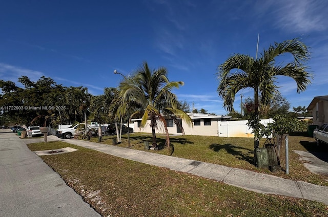 view of front of home with a front yard