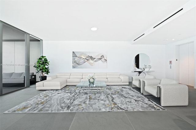 living room with concrete floors