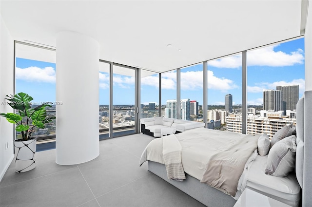 bedroom featuring floor to ceiling windows