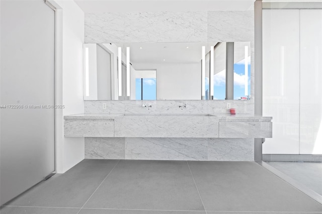 bathroom with a healthy amount of sunlight and vanity