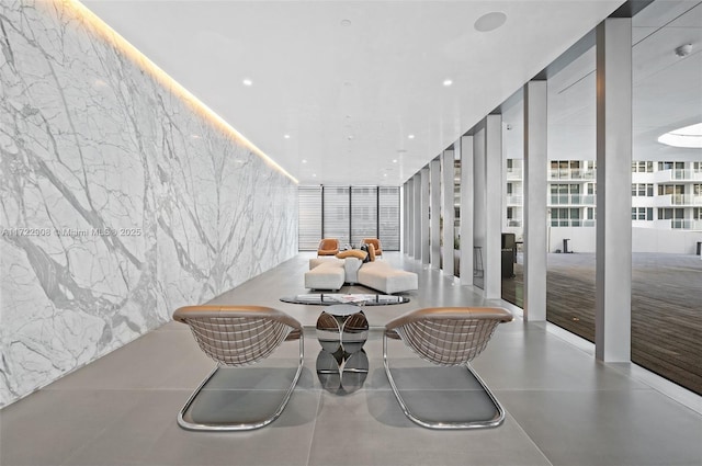 dining room featuring a wall of windows