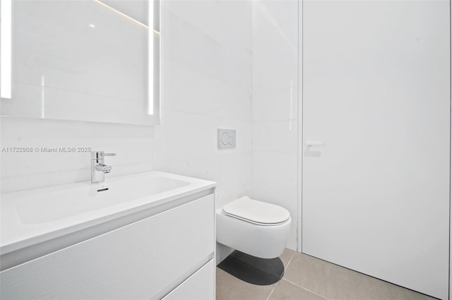 bathroom with tile patterned floors, toilet, and vanity