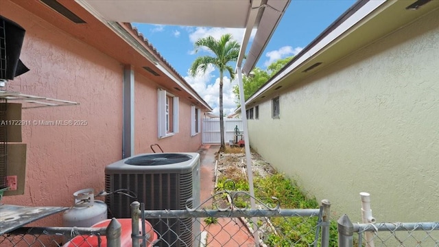 view of property exterior with cooling unit