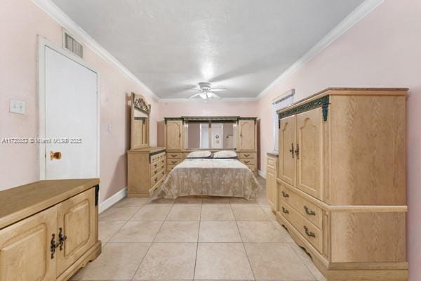 bedroom featuring light tile patterned floors, ceiling fan, and crown molding