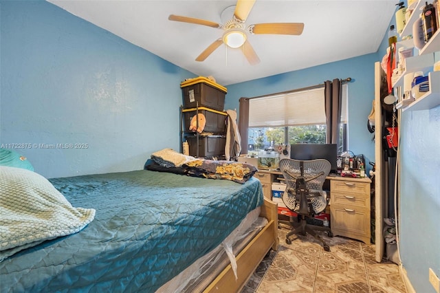 bedroom featuring ceiling fan