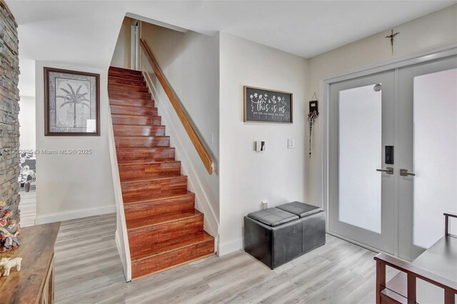 living room with light hardwood / wood-style floors