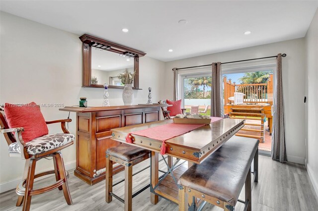 interior space featuring plenty of natural light and hardwood / wood-style flooring