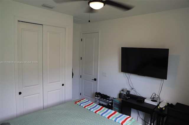 unfurnished bedroom with a closet and ceiling fan