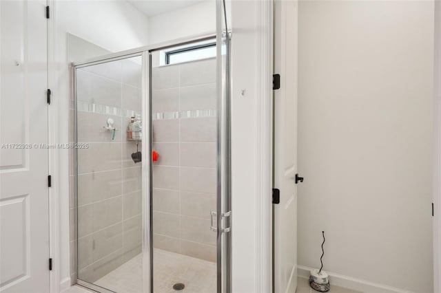 full bathroom with a shower stall
