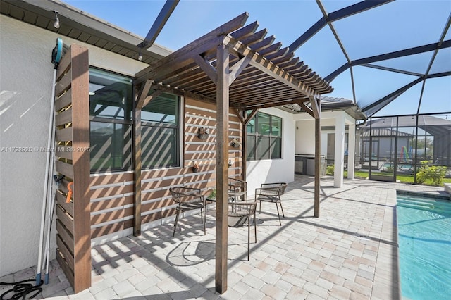 view of patio / terrace featuring a lanai and an outdoor pool