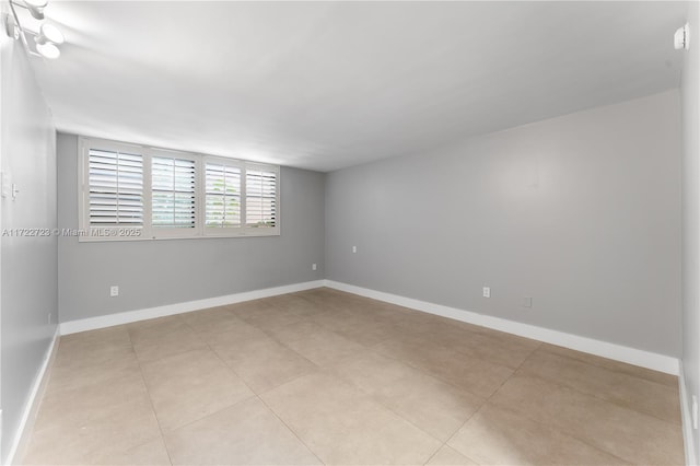 view of tiled spare room