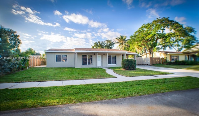 view of front facade with a front yard