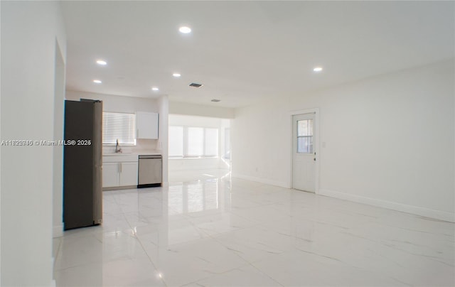 interior space with plenty of natural light and sink