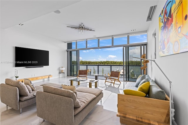 living room featuring a wall of windows