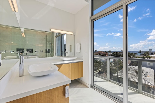 full bath featuring a wealth of natural light and a sink