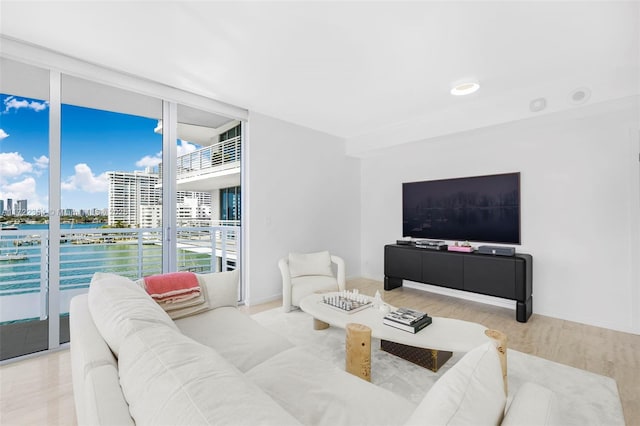 1445 16th St Unit 703, Miami Beach, FL 33139 - living room with wood finished floors, a view of city, and floor to ceiling windows