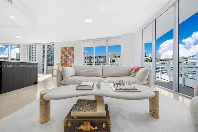 living room with floor to ceiling windows