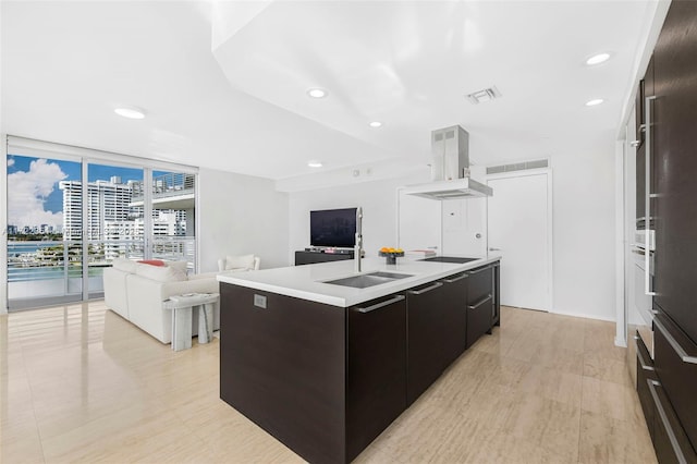 1445 16th St Unit 703, Miami Beach, FL 33139 - kitchen featuring exhaust hood, modern cabinets, a wall of windows, visible vents, and open floor plan
