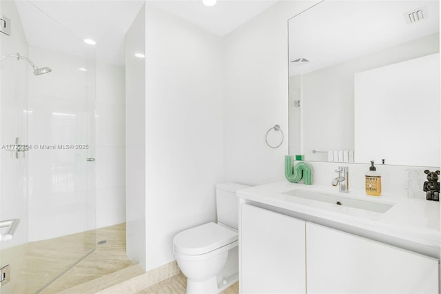 1445 16th St Unit 703, Miami Beach, FL 33139 - full bath with toilet, a walk in shower, vanity, and visible vents