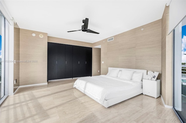 bedroom featuring ceiling fan