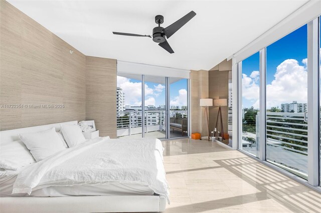 1445 16th St Unit 703, Miami Beach, FL 33139 - bedroom with access to outside, floor to ceiling windows, and a ceiling fan