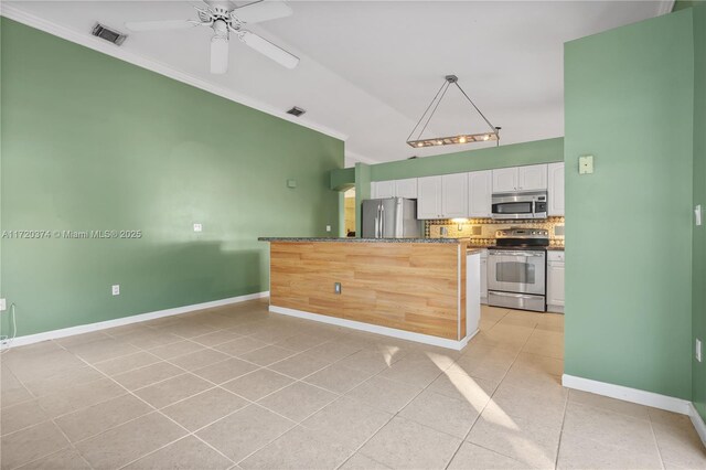 kitchen with sink, vaulted ceiling, dishwasher, and white cabinets