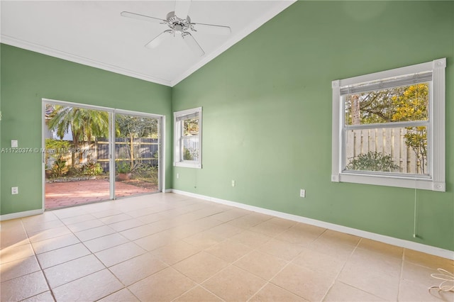 empty room featuring baseboards, a ceiling fan, ornamental molding, tile patterned flooring, and high vaulted ceiling