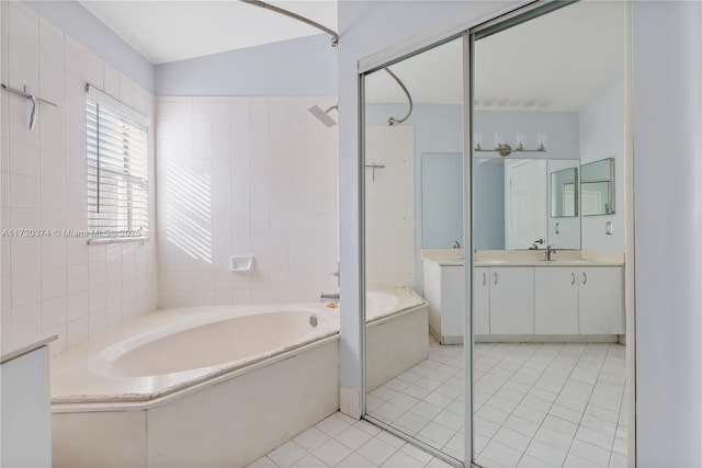 bathroom featuring tile patterned flooring, vanity, lofted ceiling, and independent shower and bath