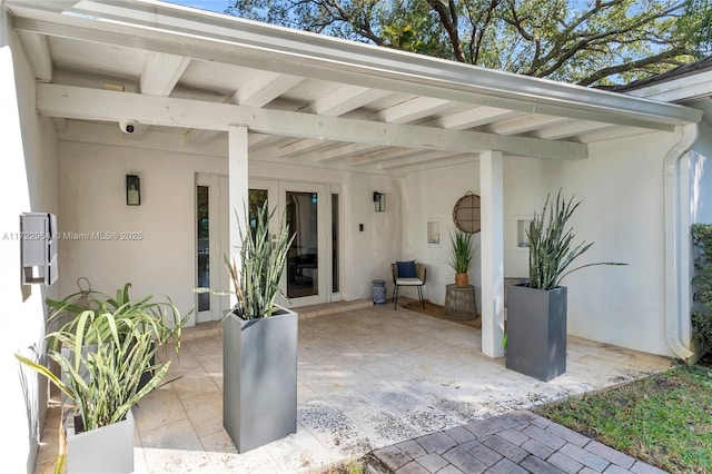 11433 NE 6th Ave, Biscayne Park, FL 33161 - view of patio / terrace featuring french doors