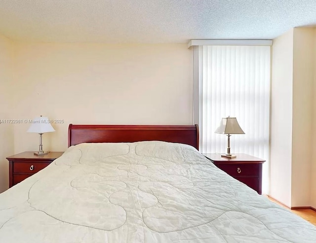 bedroom featuring a textured ceiling