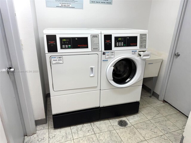 washroom featuring separate washer and dryer