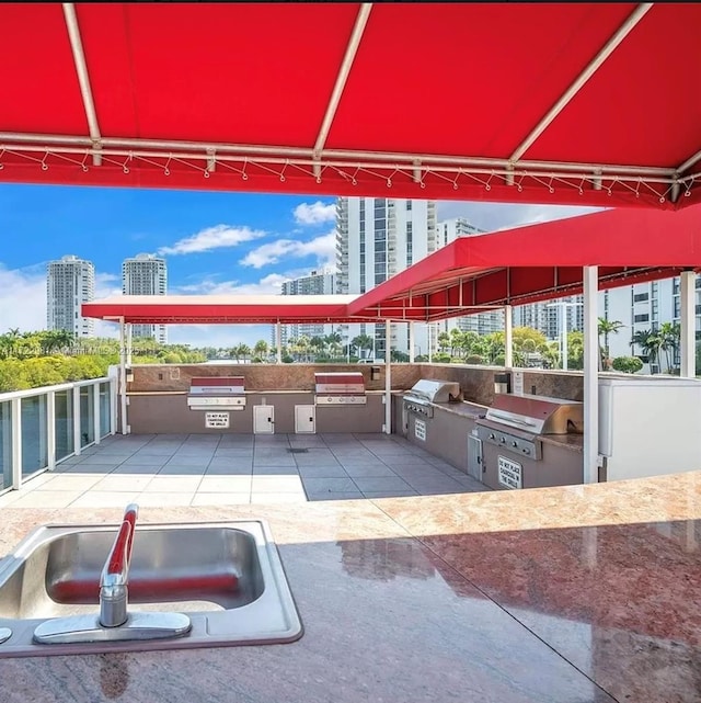 view of patio / terrace with a grill and exterior kitchen