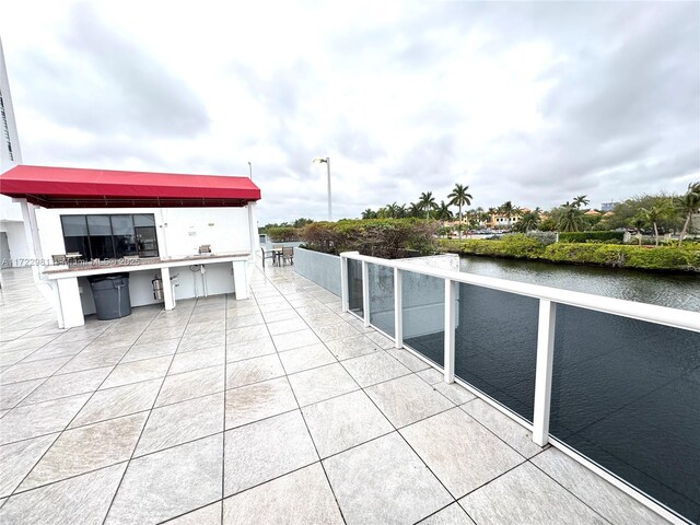 view of patio / terrace featuring a water view