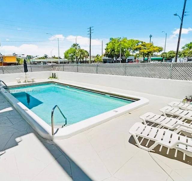 view of pool with a patio