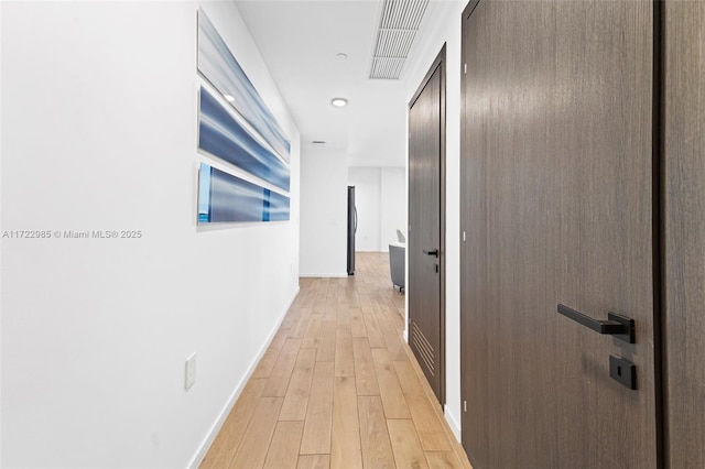 hall featuring light wood-type flooring