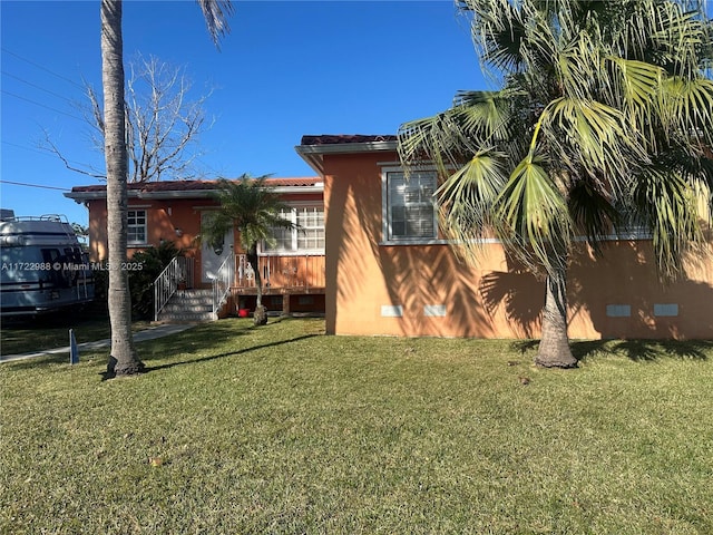 exterior space with a lawn