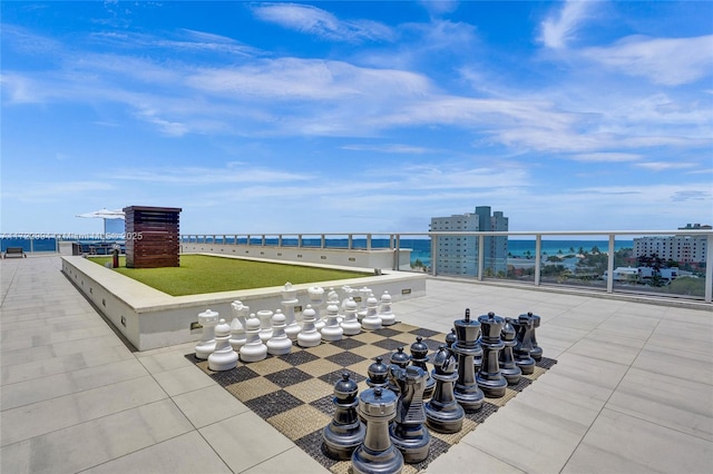 view of patio / terrace featuring a water view