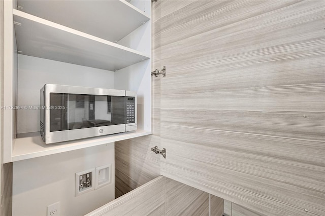 room details featuring stainless steel microwave