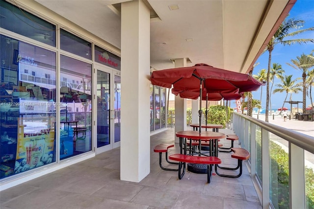 view of patio with a balcony