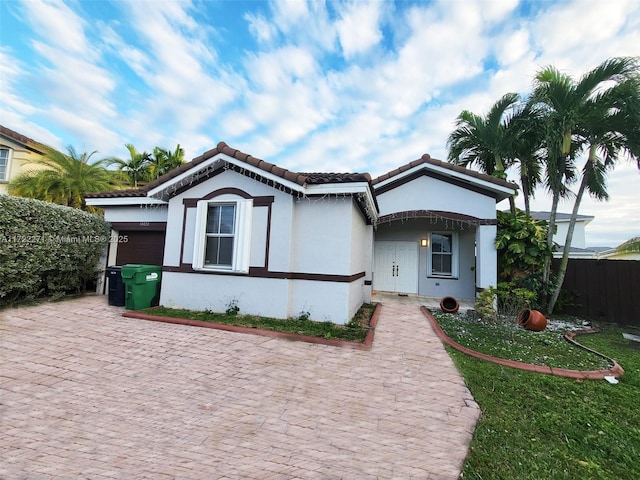 view of front of home with a garage