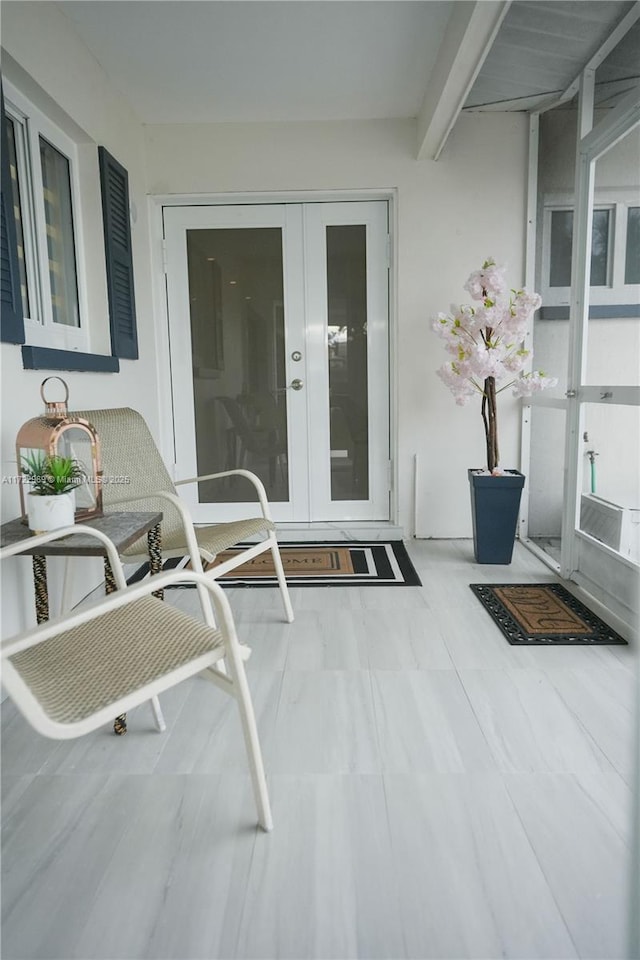 property entrance featuring french doors