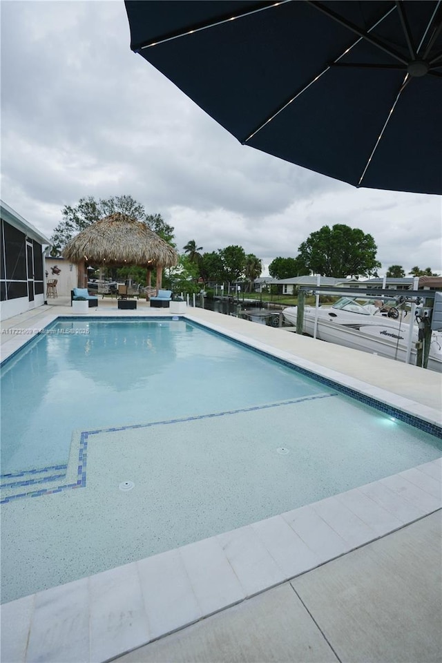 outdoor pool with a gazebo